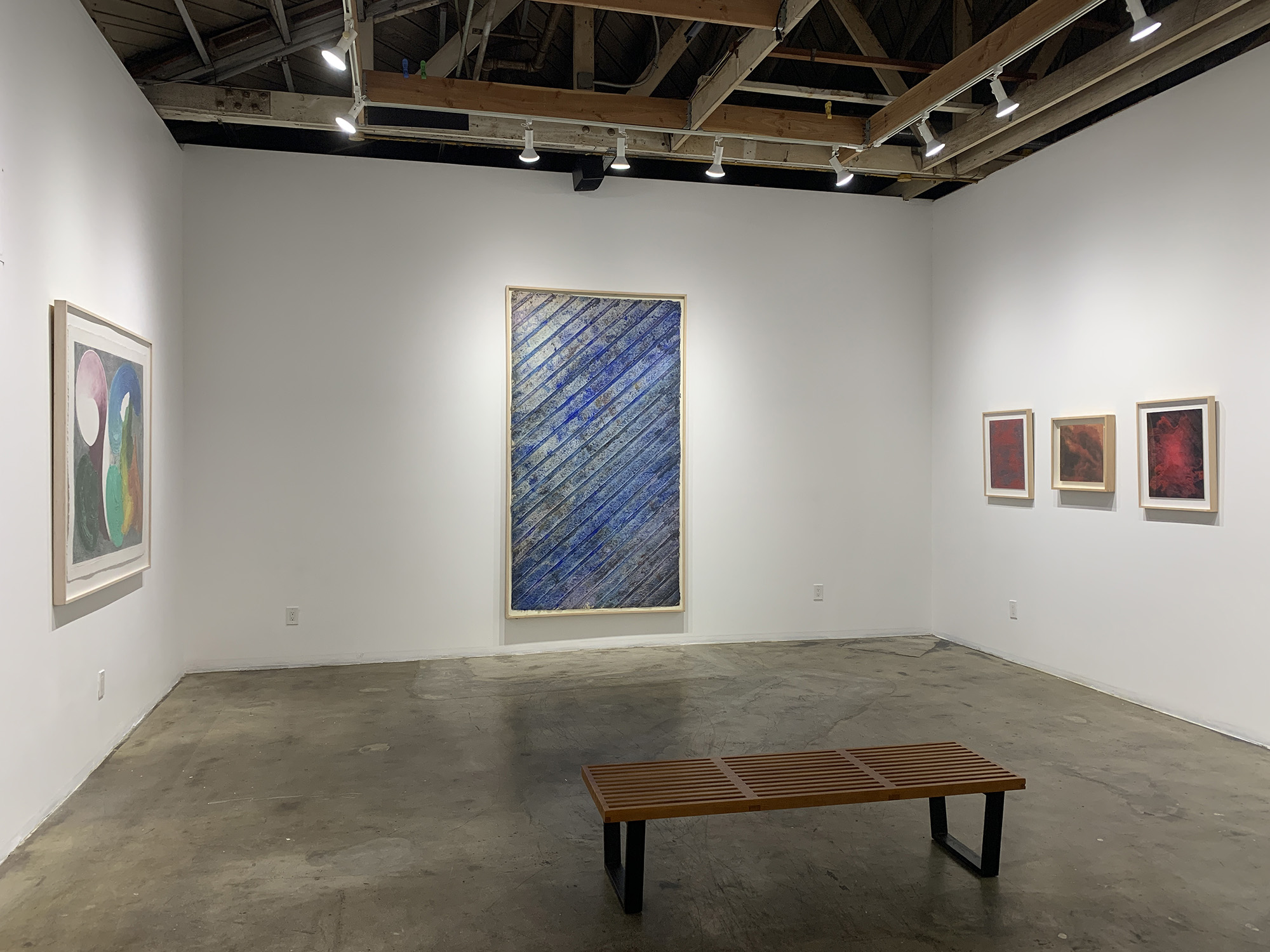 Picture of the exhibition printed landscape featuring the works of William Tillyer, Kenneth Noland, and Joe Goode, which is on view at Mixografia from July 29 - September 2, 2023.